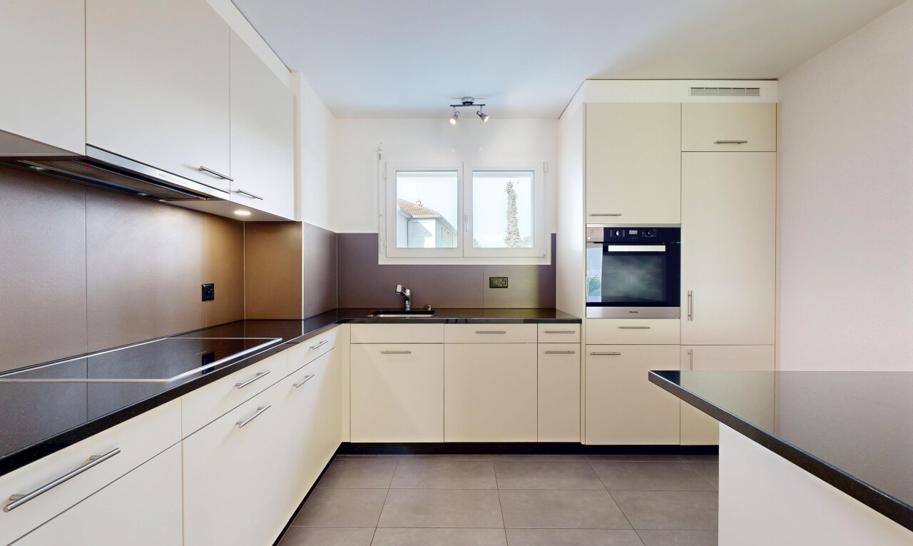 kitchen featuring stainless steel oven, black electric cooktop, light tile patterned flooring, and range hood