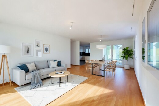 salon / salle à manger avec inside property, sol en finition bois, wood finish floor, cloison sèche, et drywall