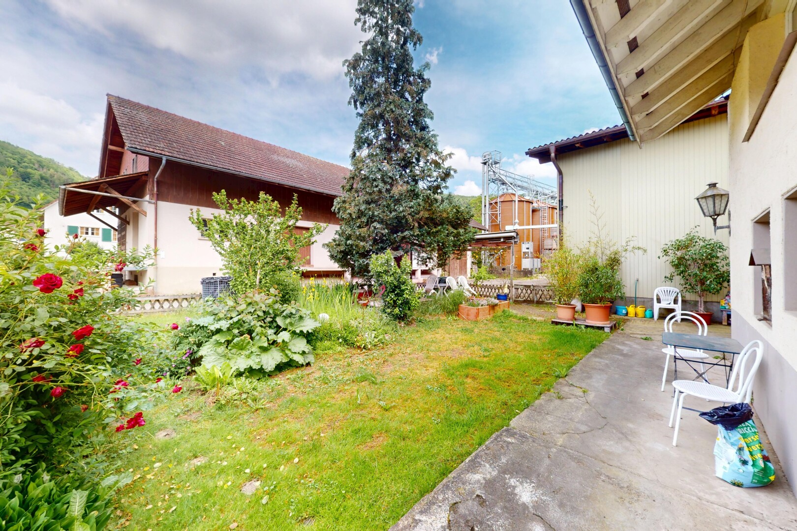 garden with a yard and a patio