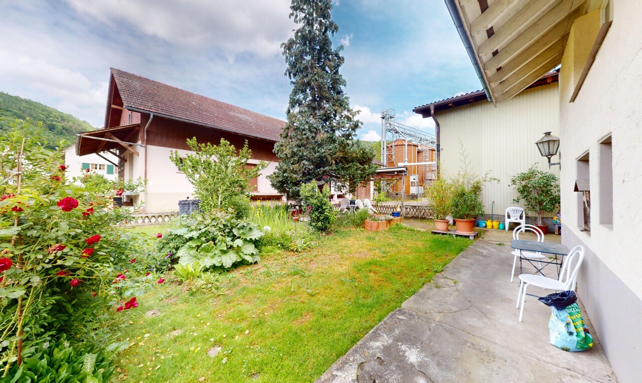 garden with a yard and a patio