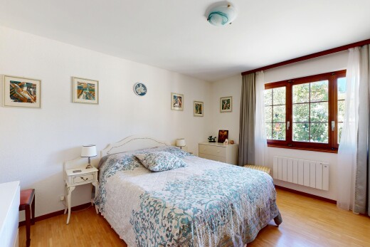 room featuring radiator and light wood finished floors