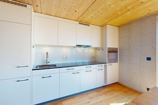 küche mit ofen, lüftungsgitter, holzdecke, holzfußboden, und waschbecken