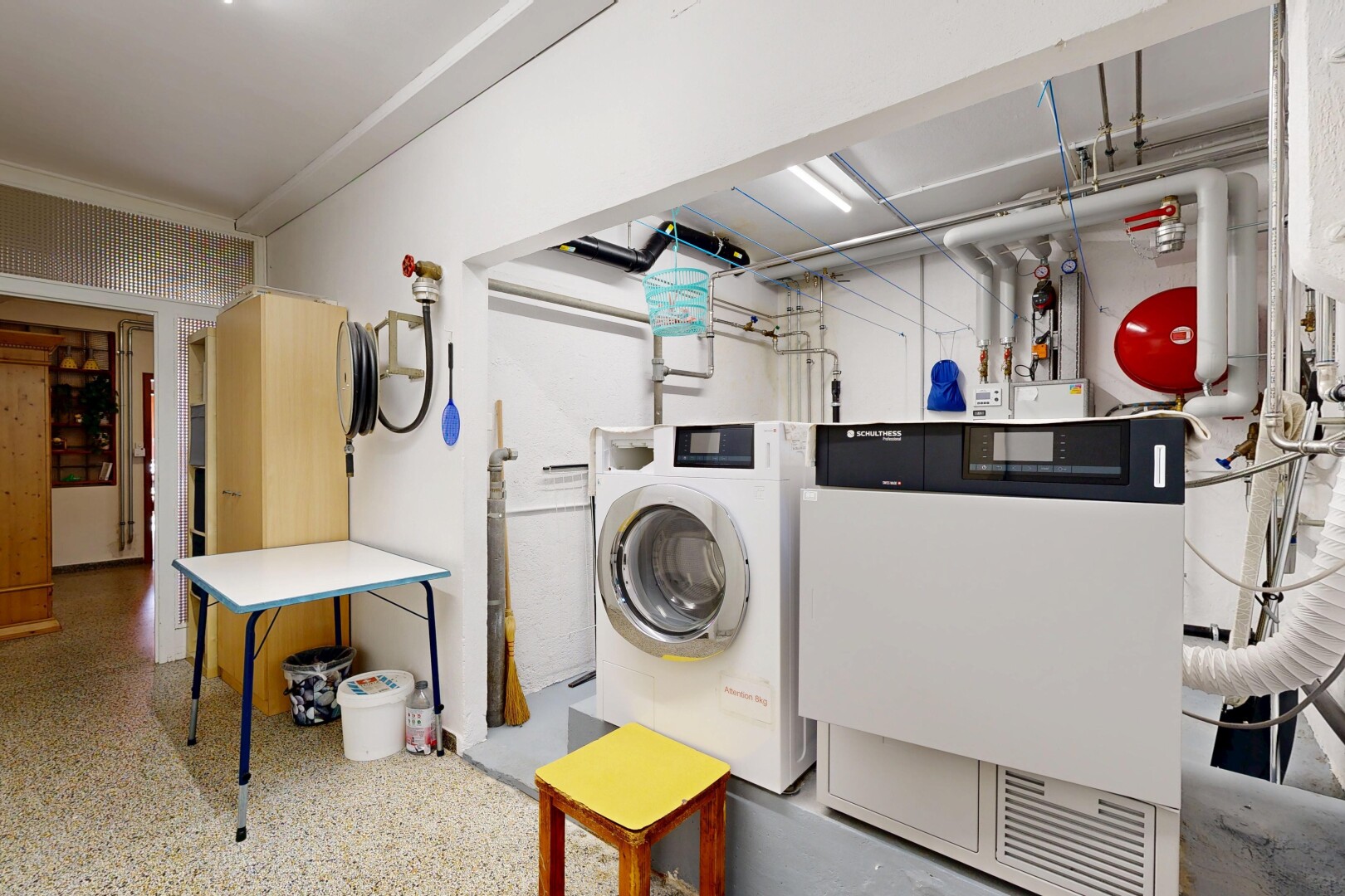 laundry room featuring washer and clothes dryer