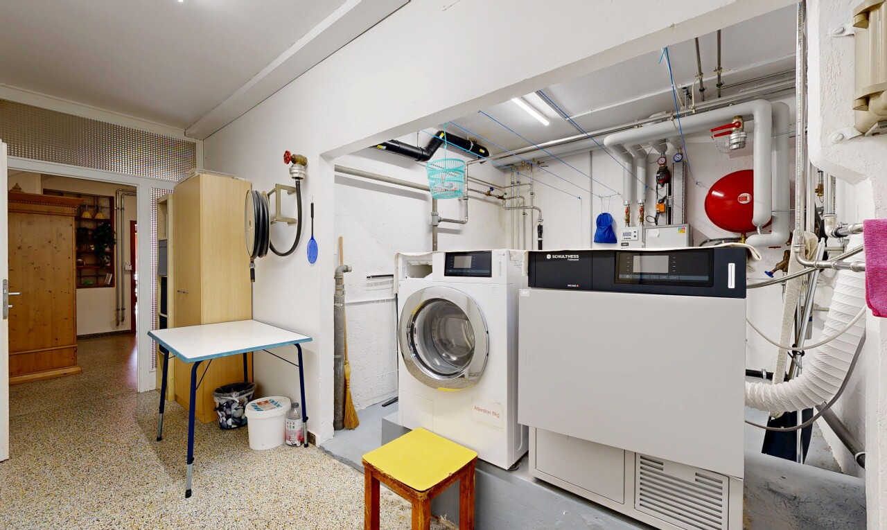laundry room featuring washer and clothes dryer