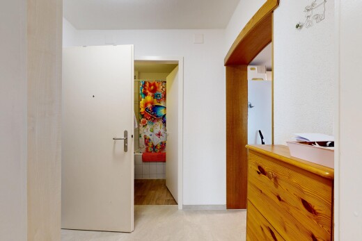 halle / korridor mit inside property, gewölbte gehwege, gipskartonwand, und drywall