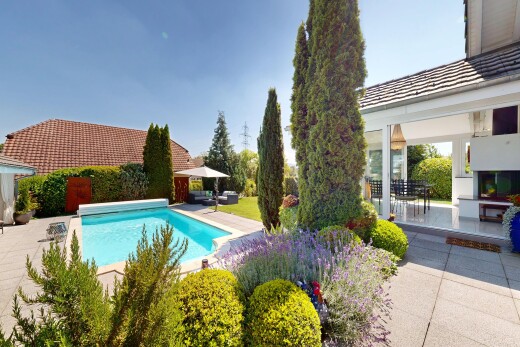 swimming pool with a patio area