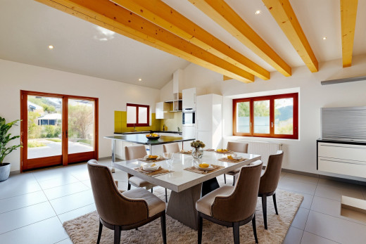 esszimmer mit balkendecke, fliesenboden, und natürliches licht