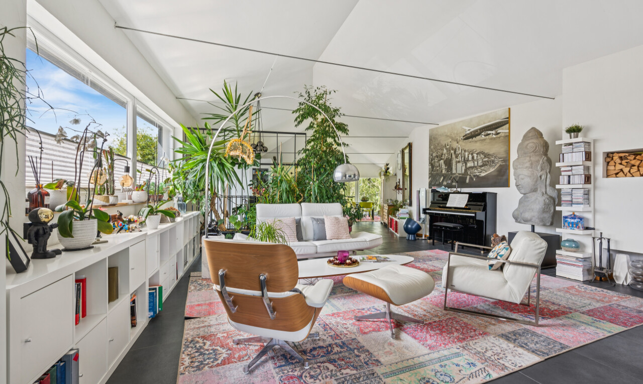 living room featuring lofted ceiling