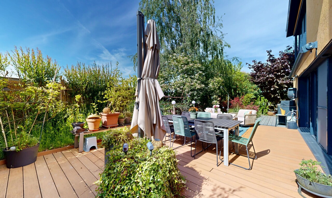 view of wooden terrace with outdoor dining space