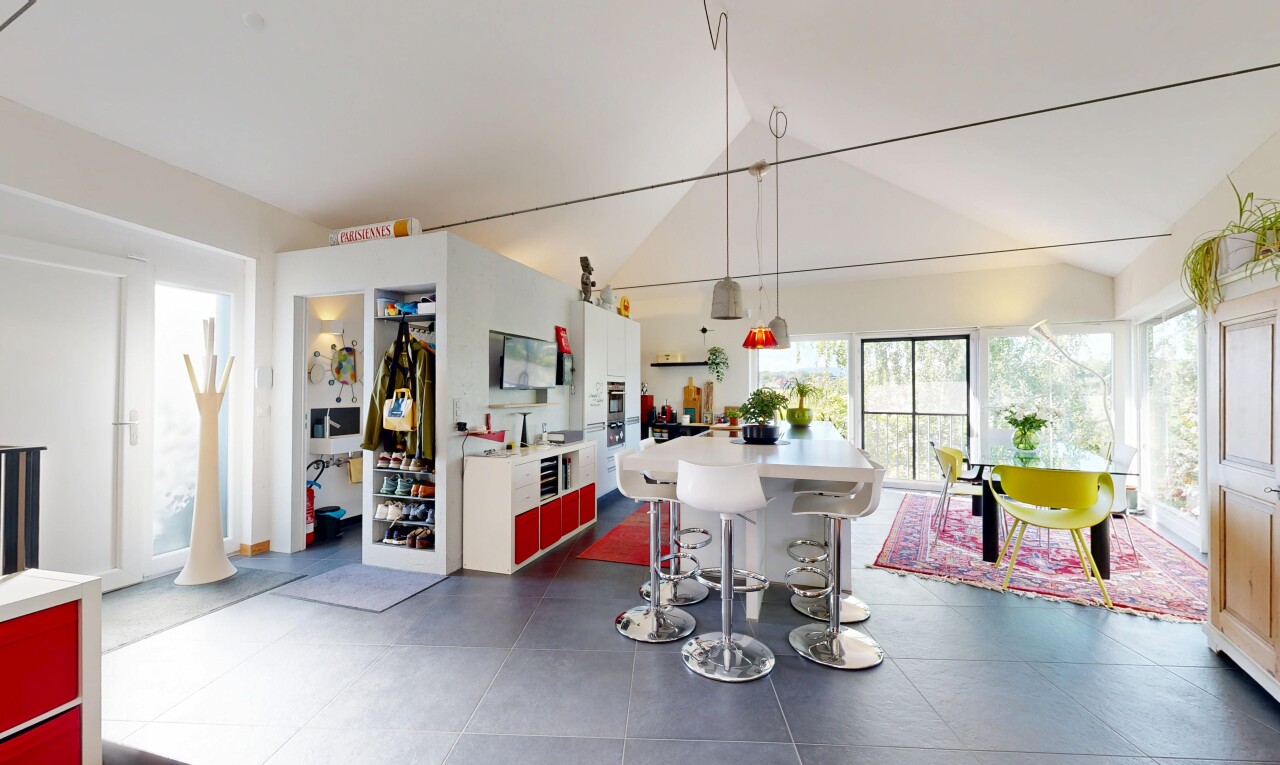 dining area with vaulted ceiling