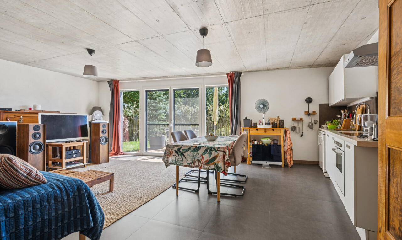 living room featuring hanging light fixtures