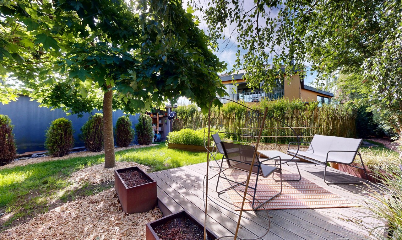 view of wooden terrace featuring a fenced backyard