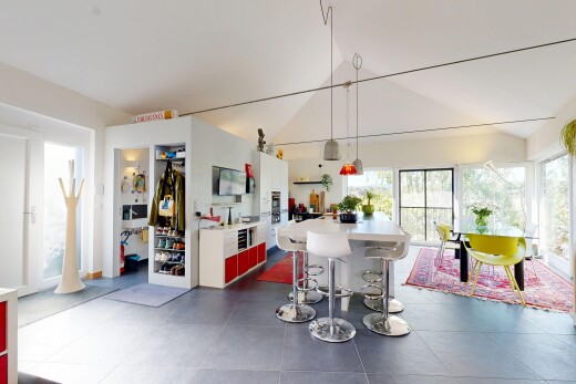 dining area with vaulted ceiling
