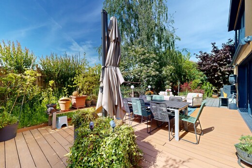 view of wooden terrace with outdoor dining space