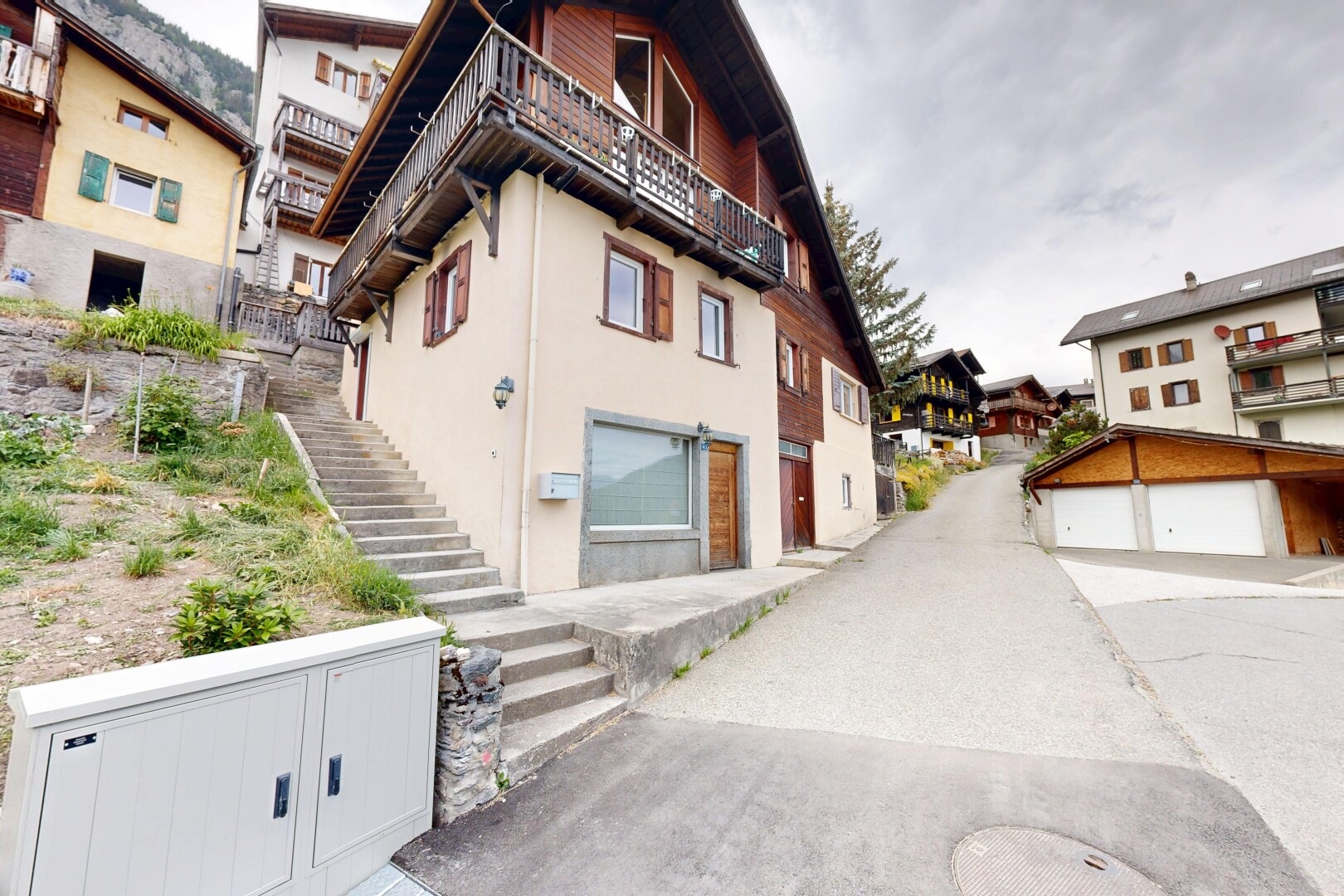 view of property featuring stairs