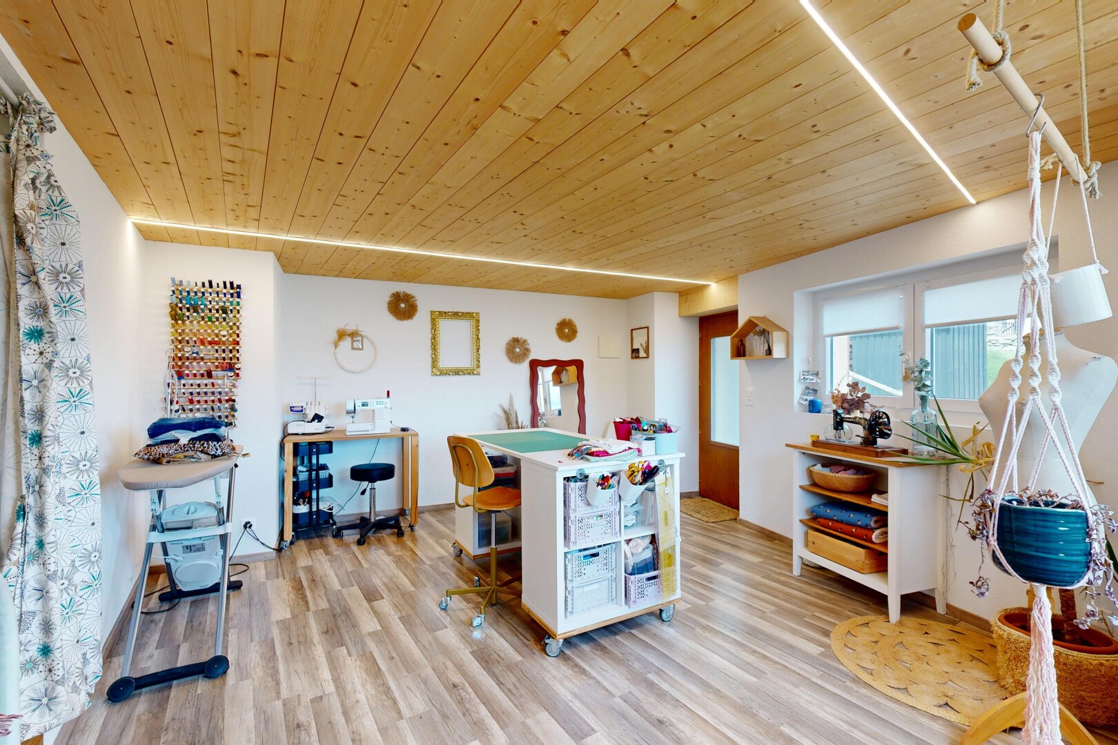 dining room featuring wood ceiling and light wood-style floors