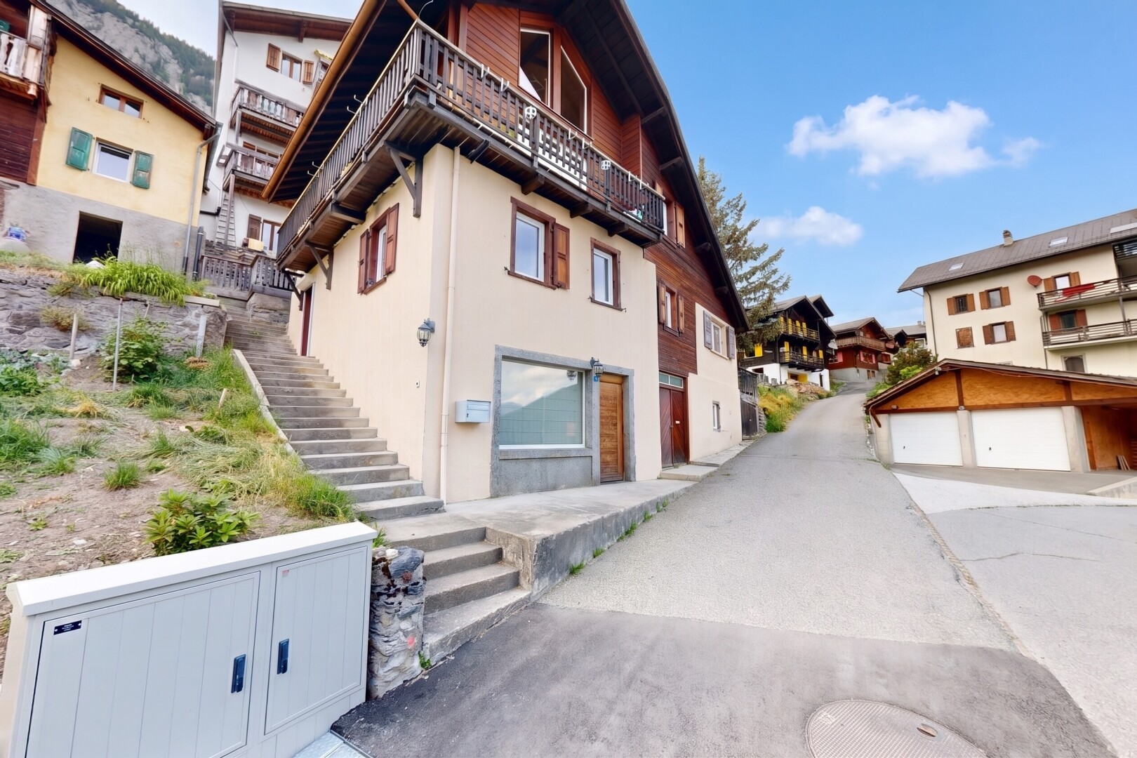 view of property featuring stairs