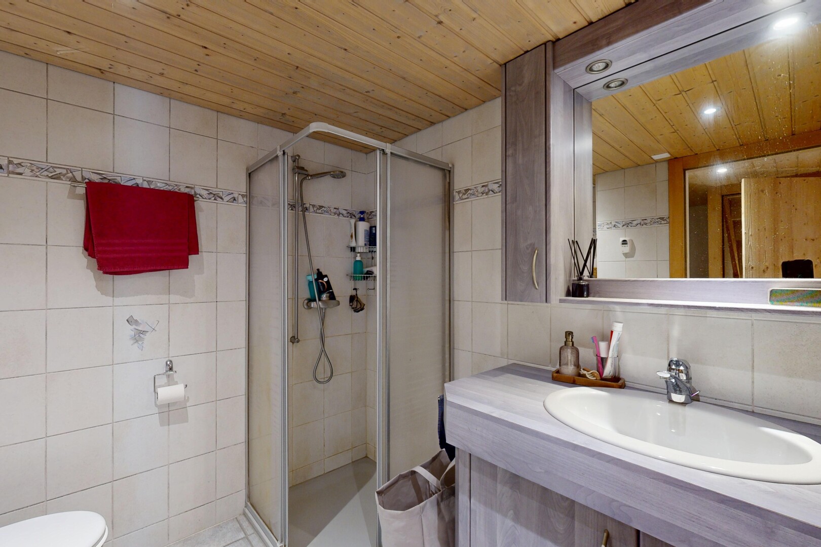 full bathroom with tile walls, a stall shower, vanity, wooden ceiling, and recessed lighting