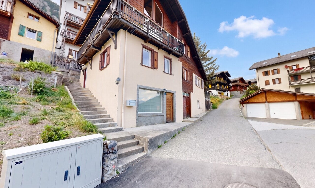 view of property featuring stairs