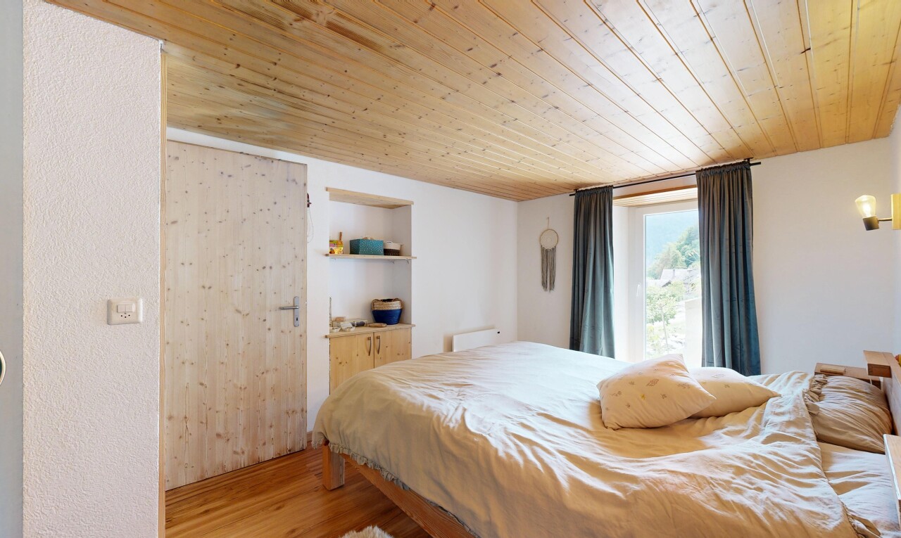 room / bedroom with wood ceiling and light wood finished floors