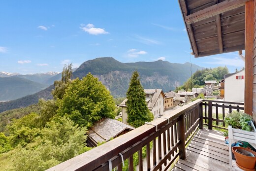 balcony featuring a mountain view