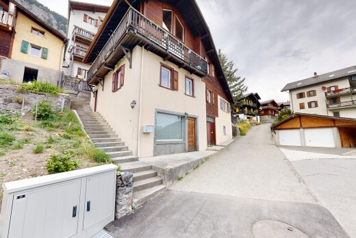 view of property featuring stairs