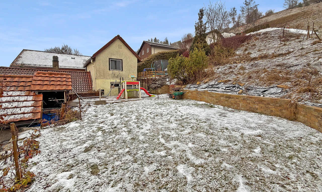 view of snow covered house