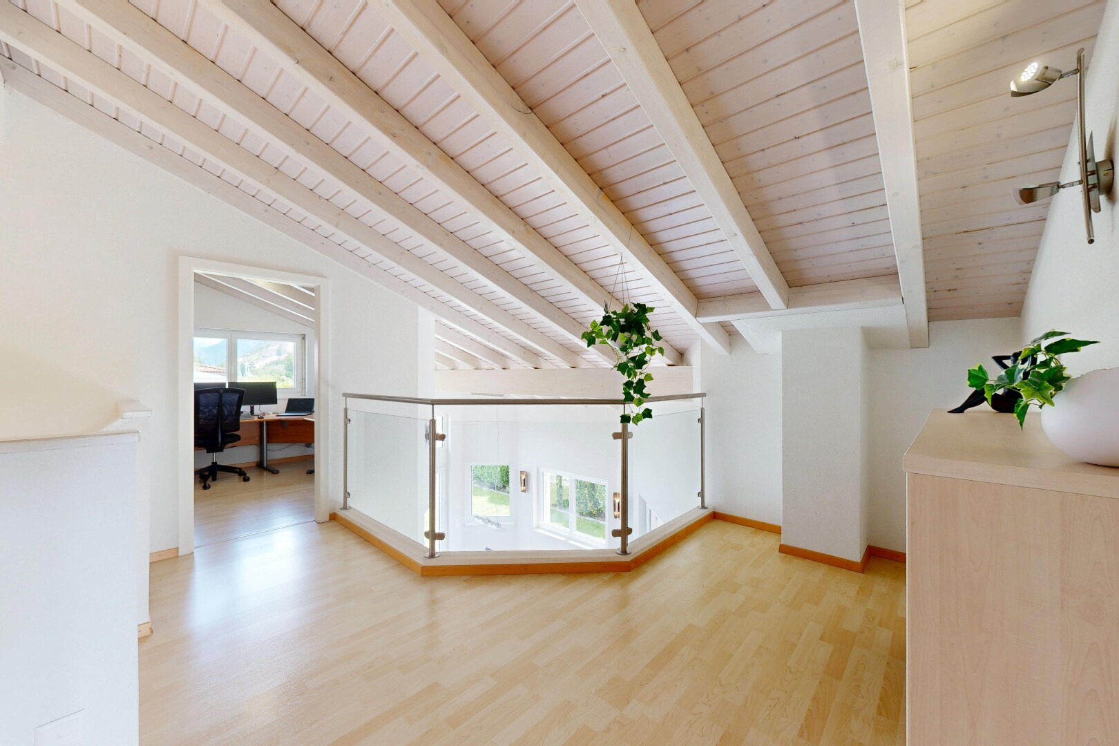 pièce vide avec cloison sèche, drywall, sol en finition bois, wood finish floor, et inside property