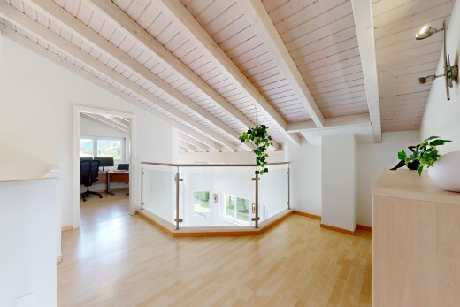 pièce vide avec cloison sèche, drywall, sol en finition bois, wood finish floor, et inside property