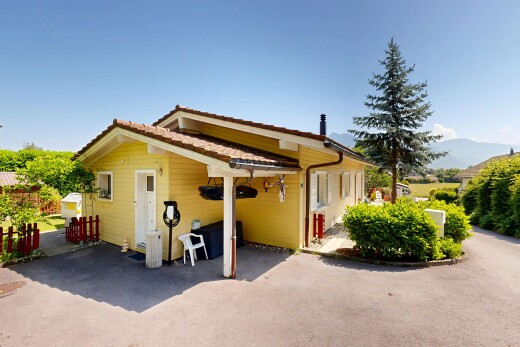 außenansicht mit horizontale verkleidung, day time, property visible, und carport angeschlossen
