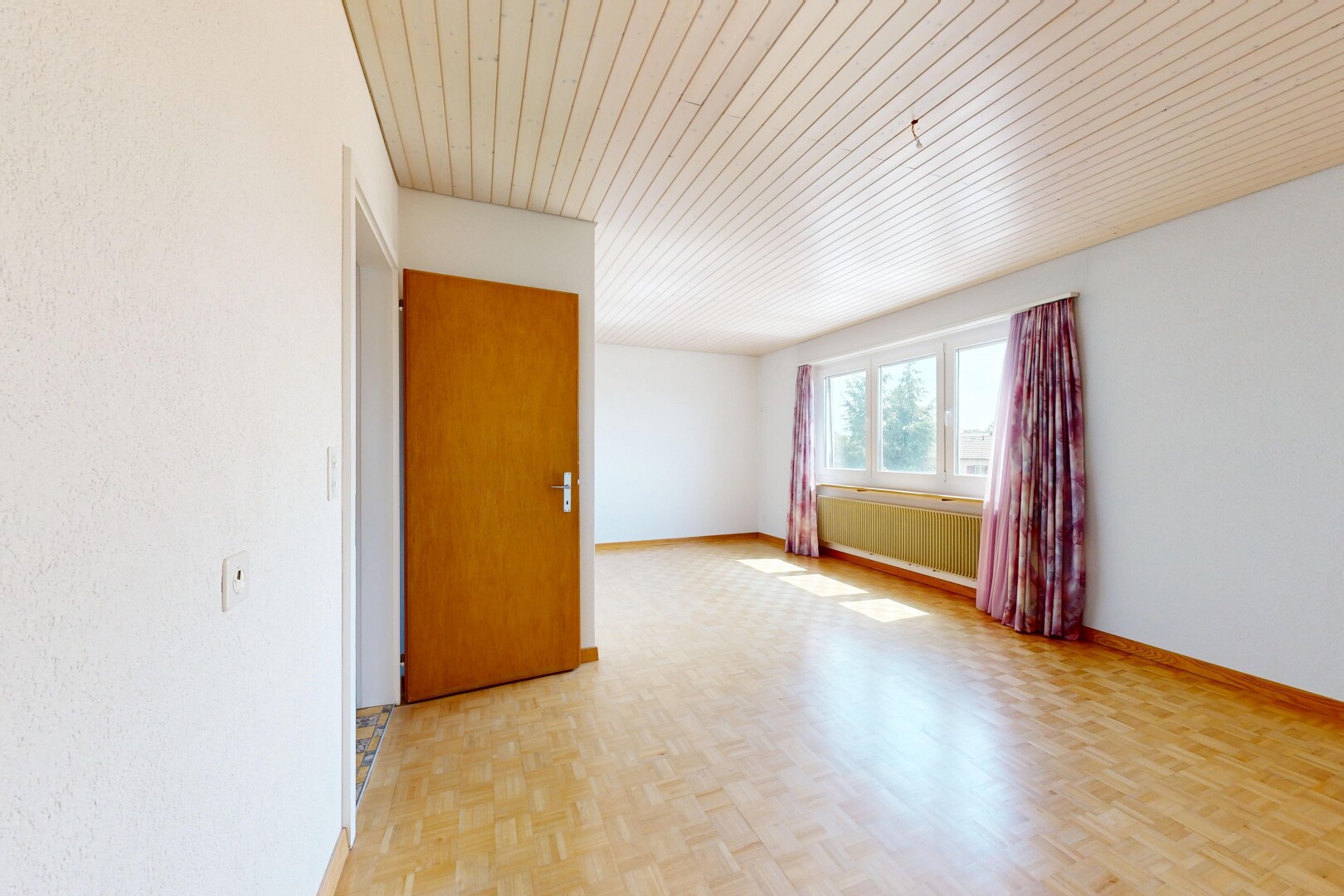 unfurnished room with parquet floors and wood ceiling