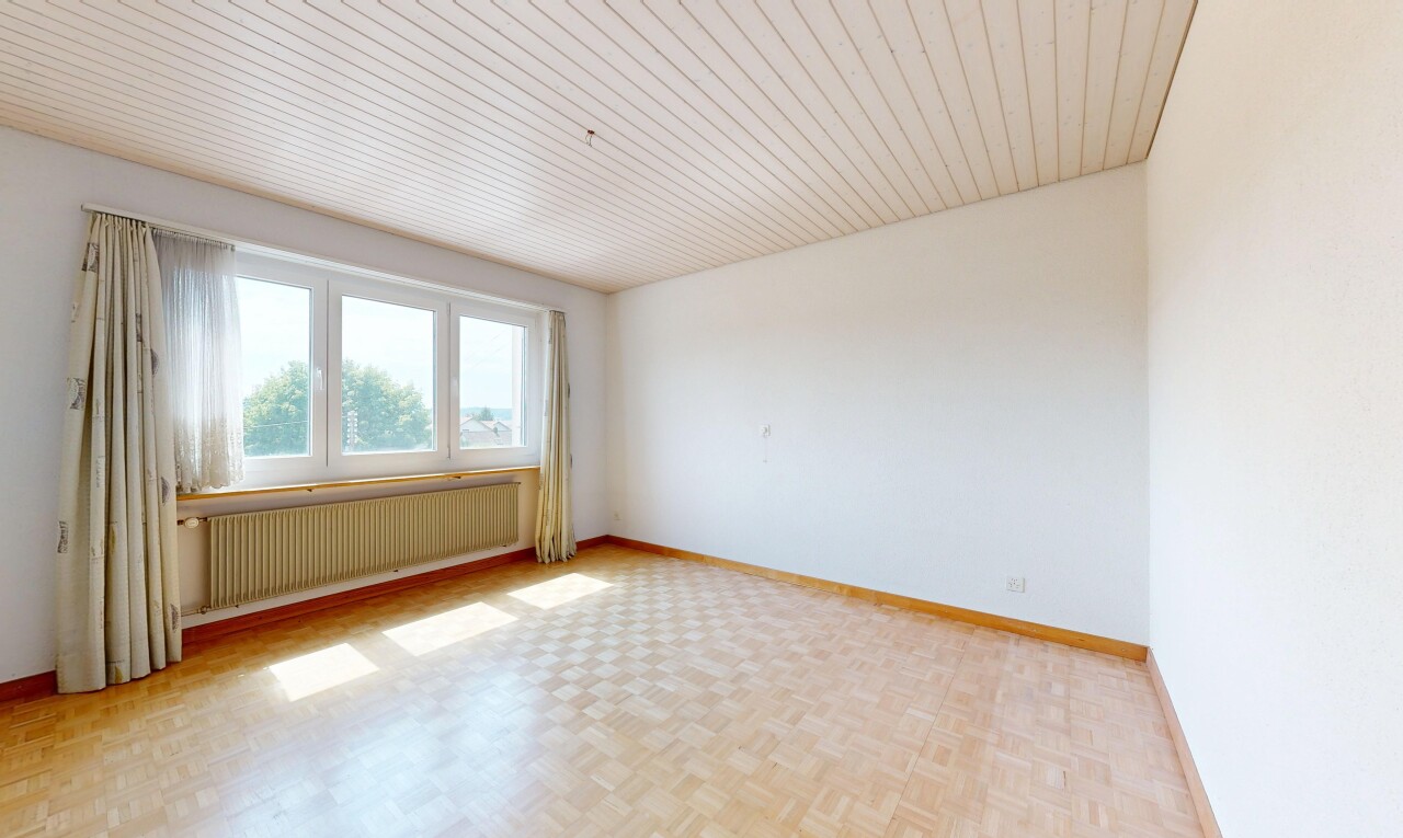 unfurnished room featuring radiator heating unit, parquet floors, and wood ceiling