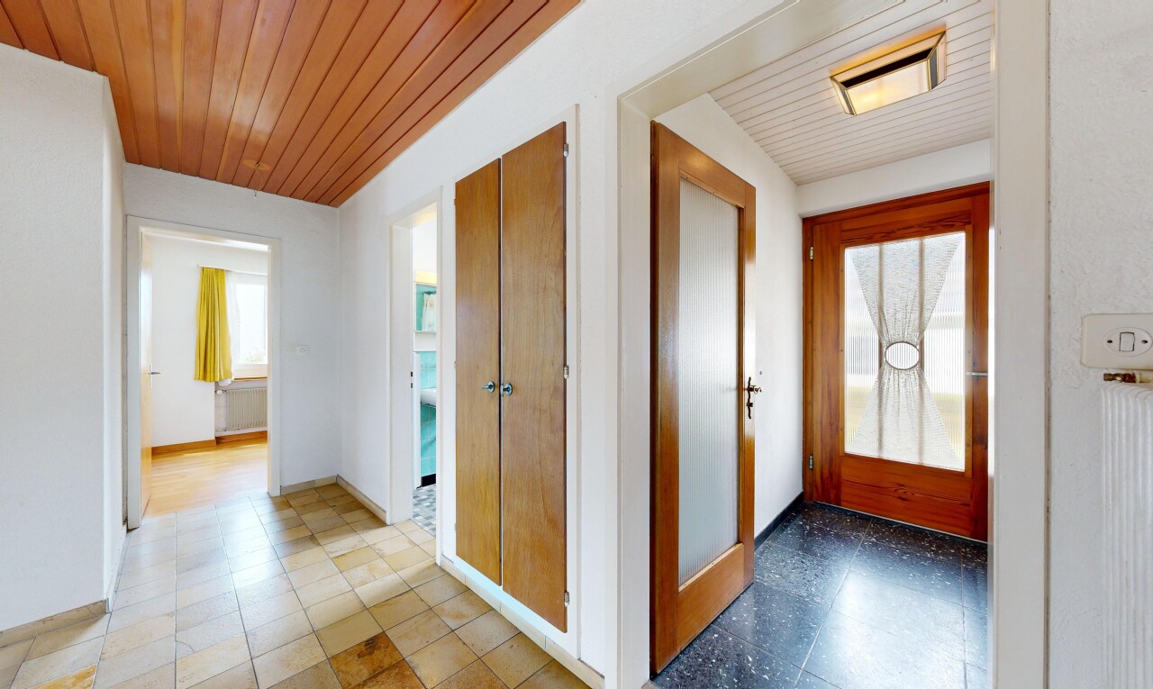 hall with wooden ceiling