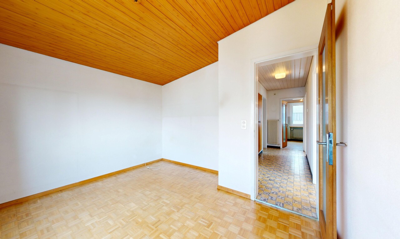 unfurnished room with wooden ceiling and parquet flooring