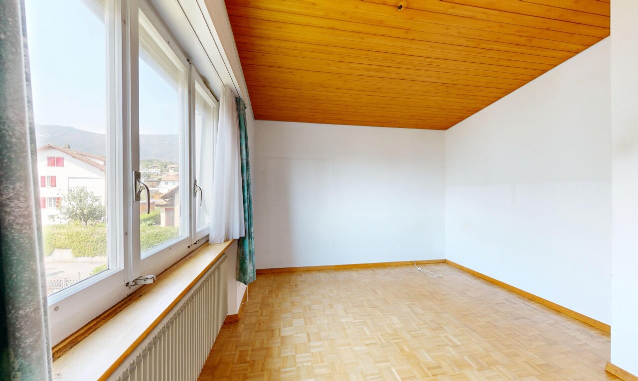 spare room featuring wooden ceiling, parquet flooring, and radiator