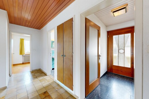 hall with wooden ceiling