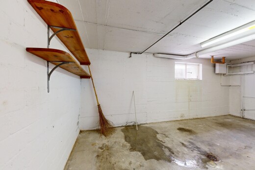 spare room with unfinished concrete floors