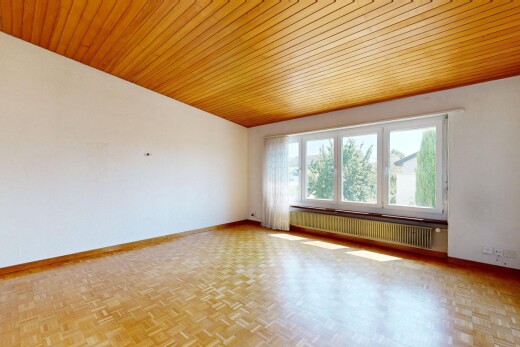 spare room featuring wood ceiling, radiator, and parquet flooring