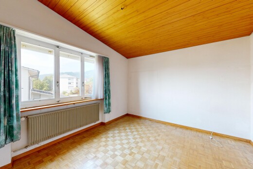 unfurnished room with radiator heating unit, a vaulted wooden ceiling, and parquet floors