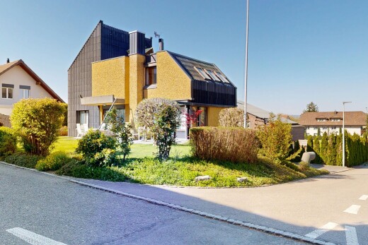 façade avec day time, bardage vertical, property visible, et pelouse