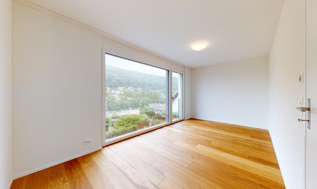 leerer raum mit inside property, gipskartonwand, drywall, holzfußboden, und wood finish floor