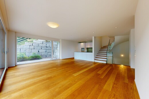 leerer raum mit treppen, drywall, gipskartonwand, inside property, und wood finish floor