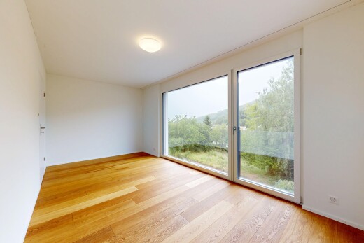 spare room with light wood finished floors