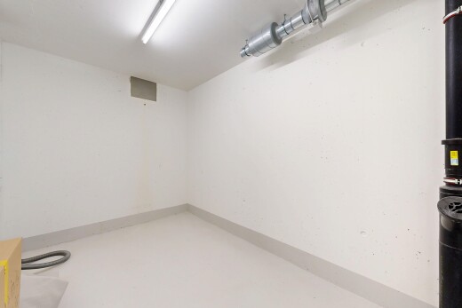 spare room with concrete floors