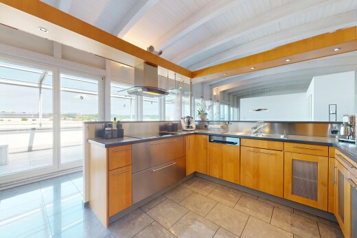 küche mit inside property, balkendecke, beamed ceiling, natürliches licht, und natural light