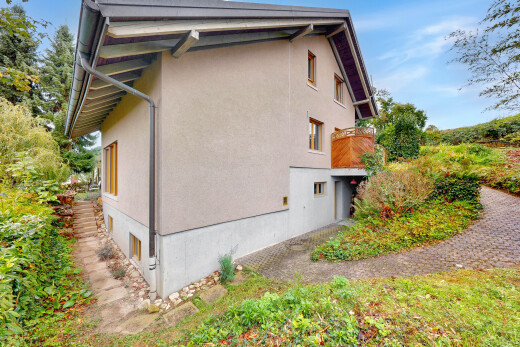 façade avec day time, bardage en stuc, et property visible