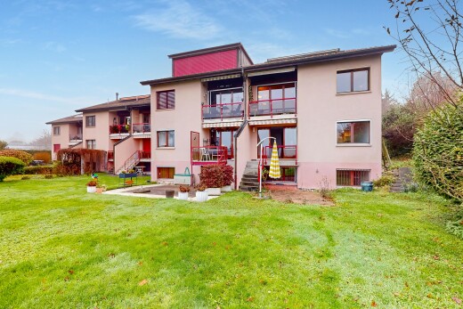 view of property featuring stairway