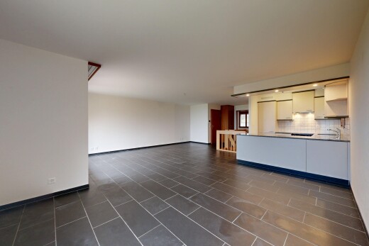 empty room with baseboards and a sink