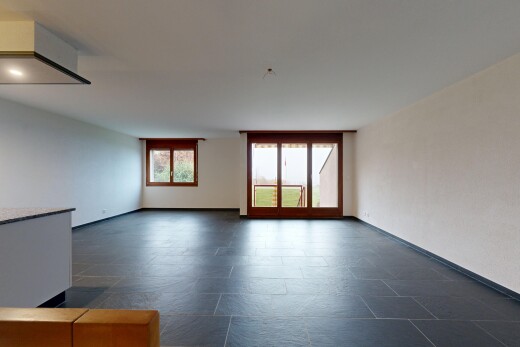 spare room with baseboards