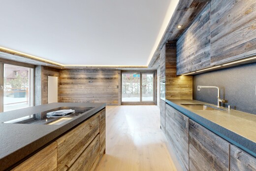 küche mit dark countertops, inside property, light floor, natural light, und natürliches licht